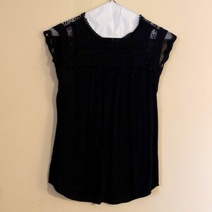 Black cap sleeve blouse with decorative detail